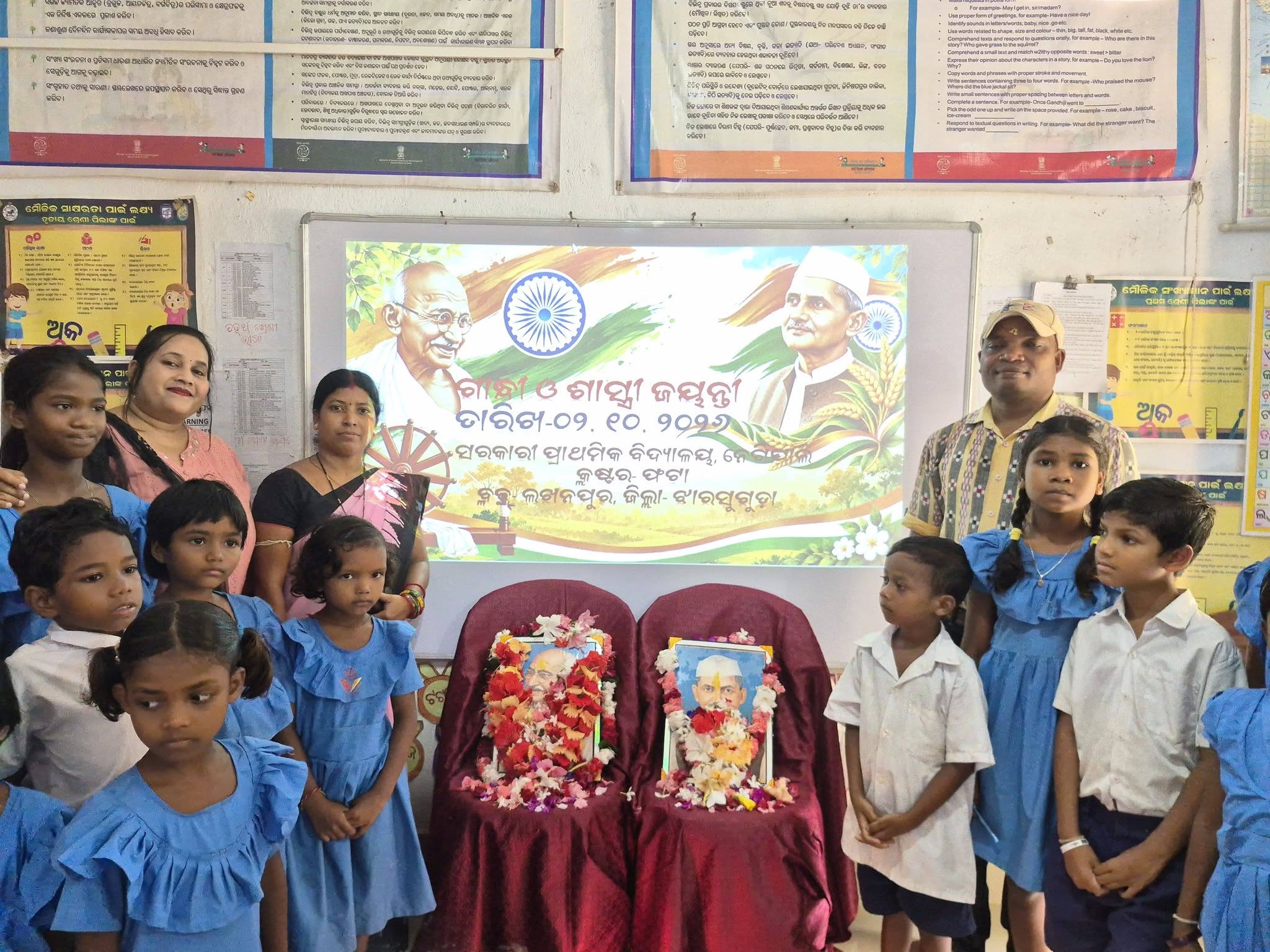Gandhi & Shastri Jayanti at My School Students beside the Gandhi and Shastri commemorative display