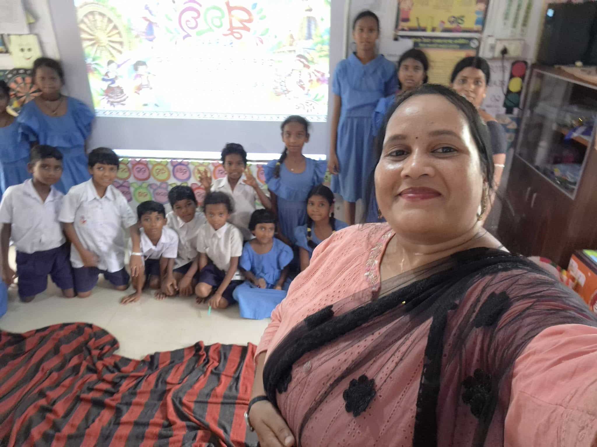 School-Level SURAVI: A Moment from My School Reena at the SURAVI gathering with students in the background